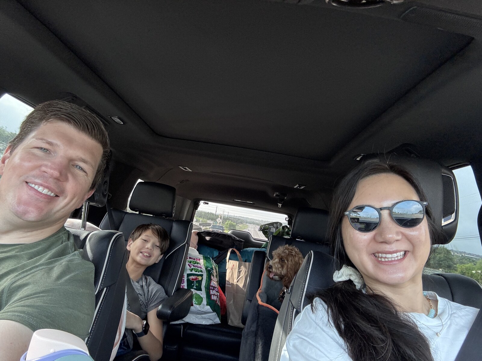 Ryan, Molly, Owen, and Harold loaded into the Escalade in Austin